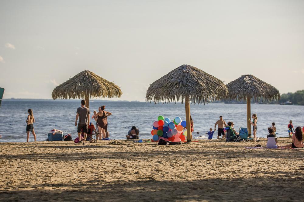 Families enjoying Saint-Zotique Municipal Beach in Montérégie